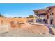 Spacious backyard patio with fire pit and pergola at 3614 E Routt Way, Pahrump, NV 89061