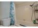 Bathroom with tub, shower, and teal accents at 3642 Haverhill St, Las Vegas, NV 89121