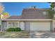 Two-story house with attached garage and manicured lawn at 3642 Haverhill St, Las Vegas, NV 89121