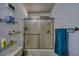 Bathroom with shower/tub combo and shelving at 3791 Desert Marina Dr # 118, Laughlin, NV 89029