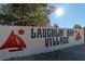 Laughlin Bay Village entrance sign with sailboat accents at 3791 Desert Marina Dr # 118, Laughlin, NV 89029