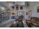 Open living space featuring a view of the kitchen and dining areas, and a custom media shelf at 3791 Desert Marina Dr # 118, Laughlin, NV 89029