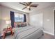 Bedroom featuring a ceiling fan and window with curtains at 3809 San Angelo Ave, Las Vegas, NV 89102