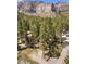 Aerial view of cabin with mountain backdrop at 4187 Matterhorn Way, Mount Charleston, NV 89124