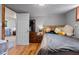 Basement bedroom with wooden headboard and plush toys at 4187 Matterhorn Way, Mount Charleston, NV 89124