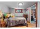 Basement bedroom with wooden headboard and plush toys at 4187 Matterhorn Way, Mount Charleston, NV 89124