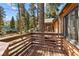 Wooden deck overlooking trees and neighboring cabins at 4187 Matterhorn Way, Mount Charleston, NV 89124