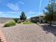 Landscaped backyard with gravel and grass at 4210 Night Star St, Las Vegas, NV 89147