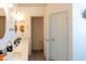 Bathroom with double sinks and a linen closet at 4210 Night Star St, Las Vegas, NV 89147