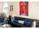 Comfortable living room with sectional sofa and large artwork at 4210 Night Star St, Las Vegas, NV 89147