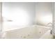 Relaxing bathroom with a soaking tub and frosted glass accents at 4381 W Flamingo Rd # 28316, Las Vegas, NV 89103