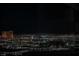 Captivating nighttime panorama of the city skyline and its sparkling lights at 4381 W Flamingo Rd # 28316, Las Vegas, NV 89103