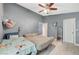 Comfortable bedroom with two beds and a ceiling fan at 4496 Arlington Park Ct, Las Vegas, NV 89110