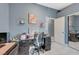 Bedroom with a vanity, desk, and gray walls at 4496 Arlington Park Ct, Las Vegas, NV 89110