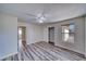 Bedroom with closet, wood-look floors and window at 5020 Valero Ct, Pahrump, NV 89060