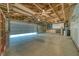 Attached garage with high ceiling and built-in shelving at 5020 Valero Ct, Pahrump, NV 89060