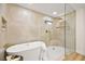 Spa-like bathroom with large shower and soaking tub at 5201 Rim View Ln, Las Vegas, NV 89130