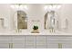 Double vanity bathroom with marble counters and gold fixtures at 5201 Rim View Ln, Las Vegas, NV 89130