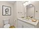 Modern bathroom with white cabinets and a quartz countertop at 5201 Rim View Ln, Las Vegas, NV 89130