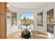 Bright breakfast nook with built-in shelving and view at 5201 Rim View Ln, Las Vegas, NV 89130