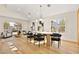 Modern dining room with wood floors and statement lighting at 5201 Rim View Ln, Las Vegas, NV 89130