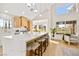 Modern kitchen with large island, quartz countertops, and stainless steel appliances at 5201 Rim View Ln, Las Vegas, NV 89130