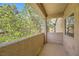 Private balcony with treetop views at 5250 S Rainbow Blvd # 2056, Las Vegas, NV 89118