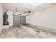 Attached garage with overhead door and ample space at 5250 S Rainbow Blvd # 2056, Las Vegas, NV 89118