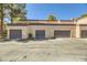 Exterior view of multiple garages at 5250 S Rainbow Blvd # 2056, Las Vegas, NV 89118