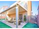 Cozy covered patio with outdoor furniture, perfect for relaxation and entertaining at 5391 Kennedy Hill Ave, Las Vegas, NV 89139