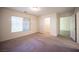 Bright bedroom featuring a walk-in closet and window at 5391 Kennedy Hill Ave, Las Vegas, NV 89139