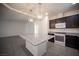 Kitchen island with granite countertop, perfect for casual dining at 5391 Kennedy Hill Ave, Las Vegas, NV 89139