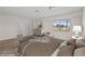 Staged bedroom with a king bed and stylish decor at 5458 Walton Heath Ave, Las Vegas, NV 89142