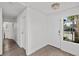 Bright entryway with white walls and wood-look floors at 5458 Walton Heath Ave, Las Vegas, NV 89142