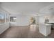 Bright living room with hardwood floors and sliding doors at 5458 Walton Heath Ave, Las Vegas, NV 89142