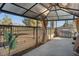 Covered patio with built-in grill and view at 5458 Walton Heath Ave, Las Vegas, NV 89142