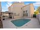 Inviting rectangular pool with gazebo in the backyard at 5458 Walton Heath Ave, Las Vegas, NV 89142