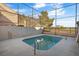 Relaxing rectangular pool in a fenced backyard at 5458 Walton Heath Ave, Las Vegas, NV 89142