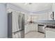 Eat-in kitchen with stainless steel appliances and granite countertops at 5608 Port Barrington Way, Las Vegas, NV 89130