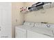 Bright laundry room with washer and dryer at 5608 Port Barrington Way, Las Vegas, NV 89130