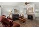 Spacious living room features a fireplace and hardwood floors at 5608 Port Barrington Way, Las Vegas, NV 89130