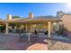 Backyard patio with seating area, and covered pergola at 5608 Port Barrington Way, Las Vegas, NV 89130