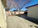 Backyard patio featuring a mature tree for shade and privacy at 619 Brush St, Las Vegas, NV 89107