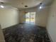 Sunlit living room featuring sliding glass doors leading to outdoor space; ready for personalized flooring at 619 Brush St, Las Vegas, NV 89107