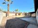 Backyard with covered patio, pool, and landscaping at 6402 Agua Dr, Las Vegas, NV 89103