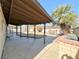 Large backyard with covered patio, pool, and BBQ area at 6402 Agua Dr, Las Vegas, NV 89103