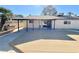 Backyard with covered patio and large concrete slab at 6402 Agua Dr, Las Vegas, NV 89103