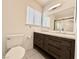 Modern bathroom with double vanity, updated cabinets, and a shower at 6402 Agua Dr, Las Vegas, NV 89103