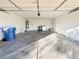 Attached garage with washer, dryer, and ample storage space at 6402 Agua Dr, Las Vegas, NV 89103