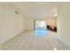 Bright living room with tiled floors and sliding glass doors at 6402 Agua Dr, Las Vegas, NV 89103